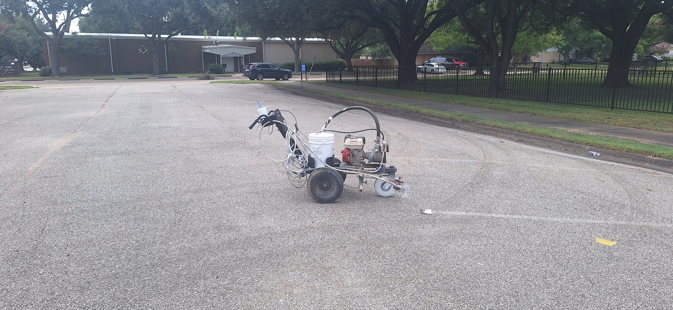 Striping equipment positioned in the Sugar Land Methodist Church parking lot